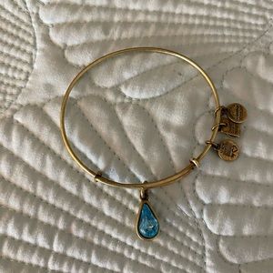 Alex and Ani gold metal adjustable bracelet bright blue faux gem